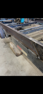 Heavy steel truck or trailer body undergoing repair