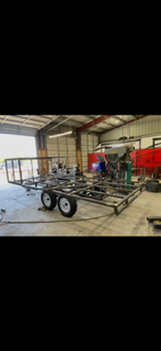 Completed custom trailer frame with axle and wheels