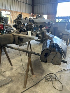 Custom steel support assembly on a fabrication stand
