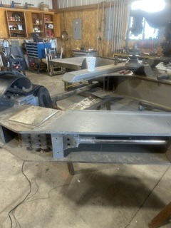 Fabricated steel frame rail assembly