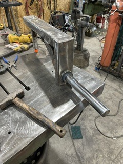 Custom welded mounting bracket and tube assembly