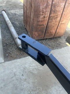 Finished black steel trailer tongue component